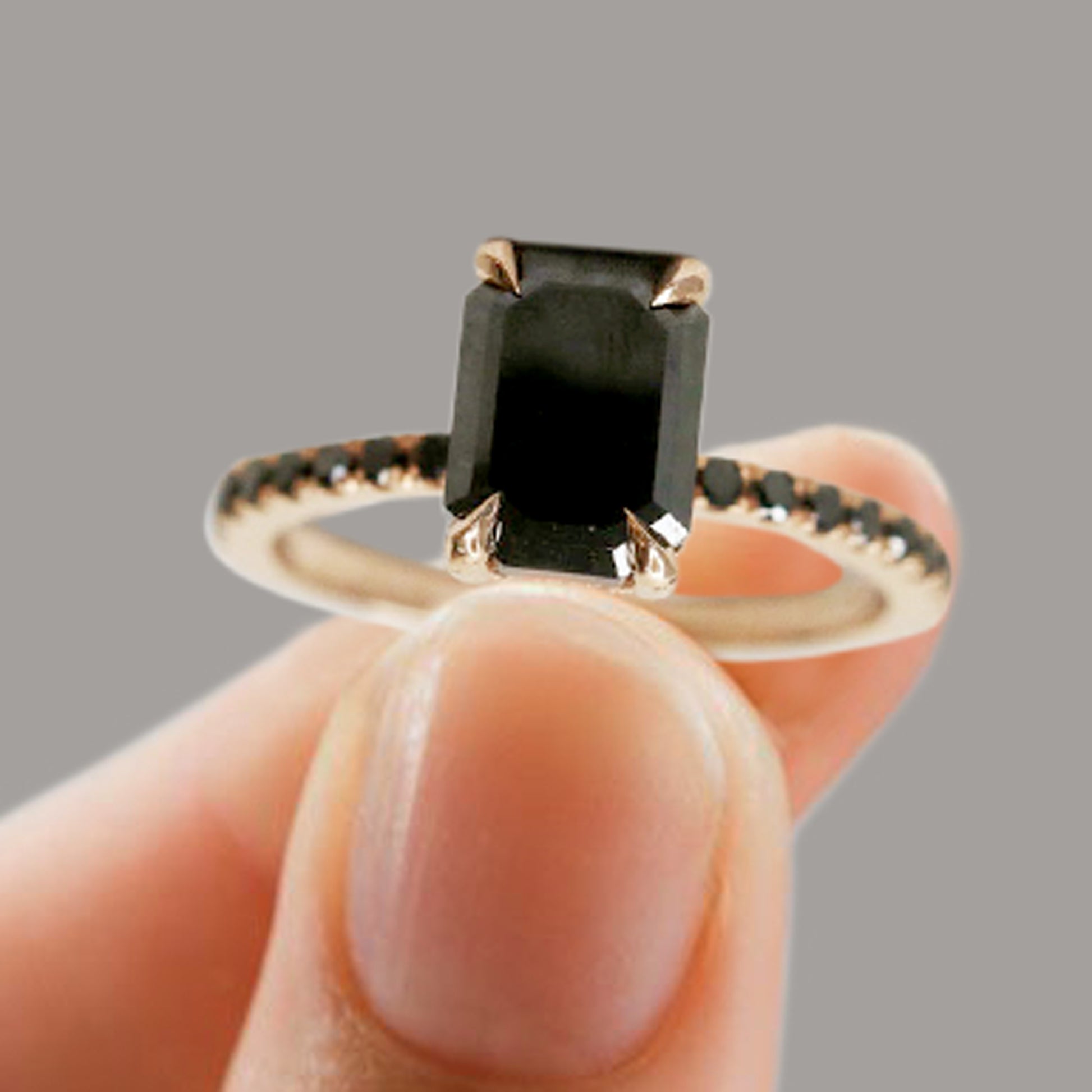 black diamond emerald cut ring