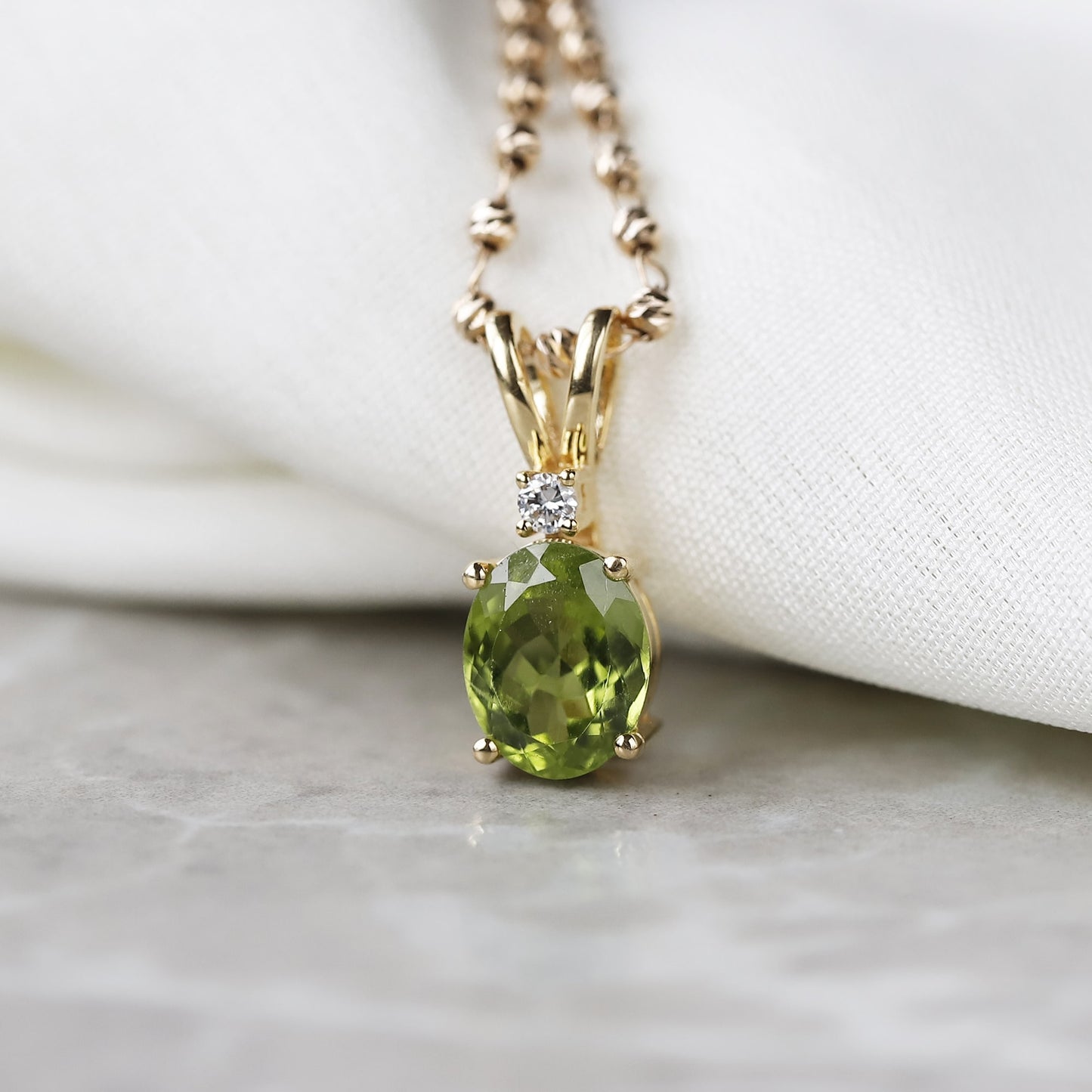 yellow gold peridot pendant