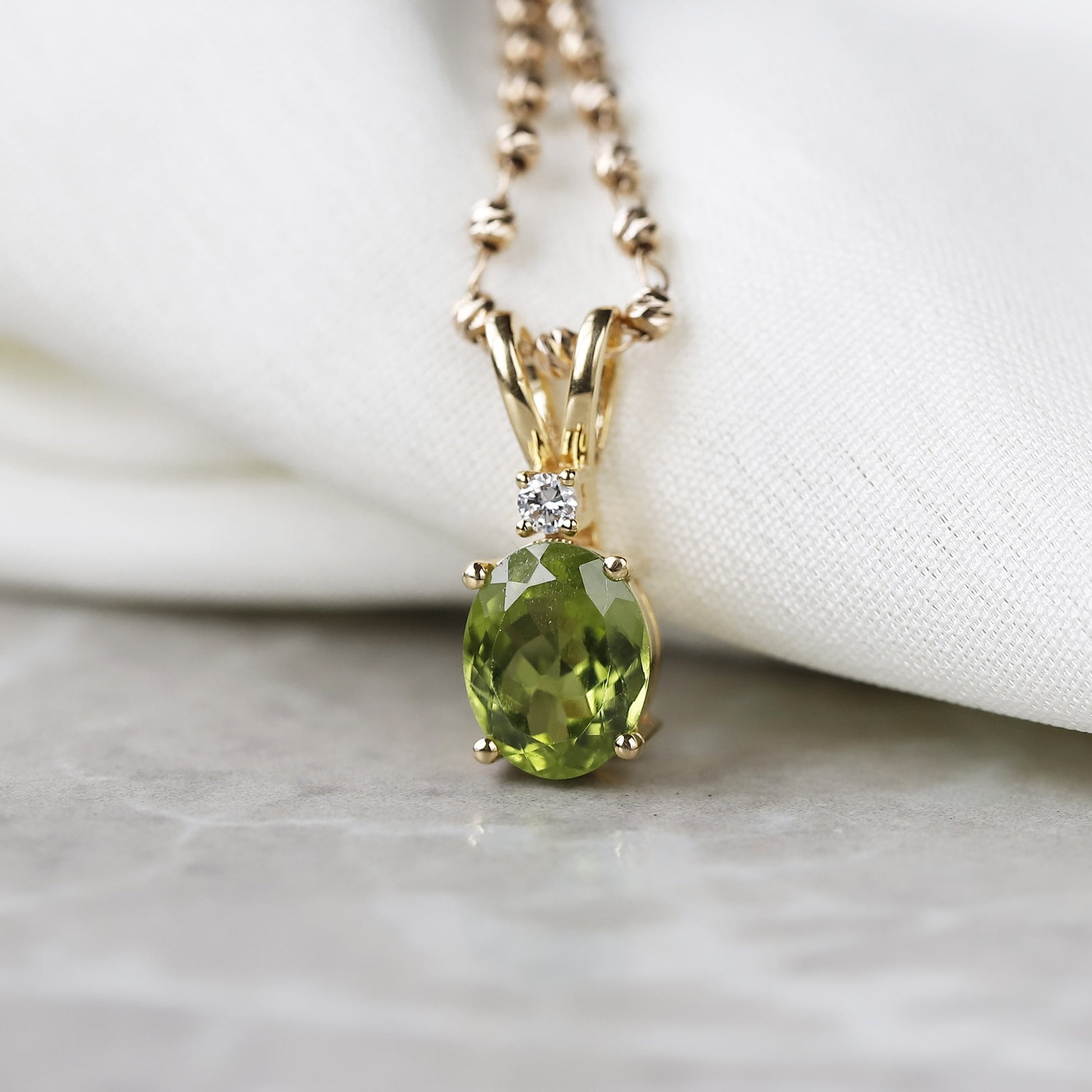 yellow gold peridot pendant