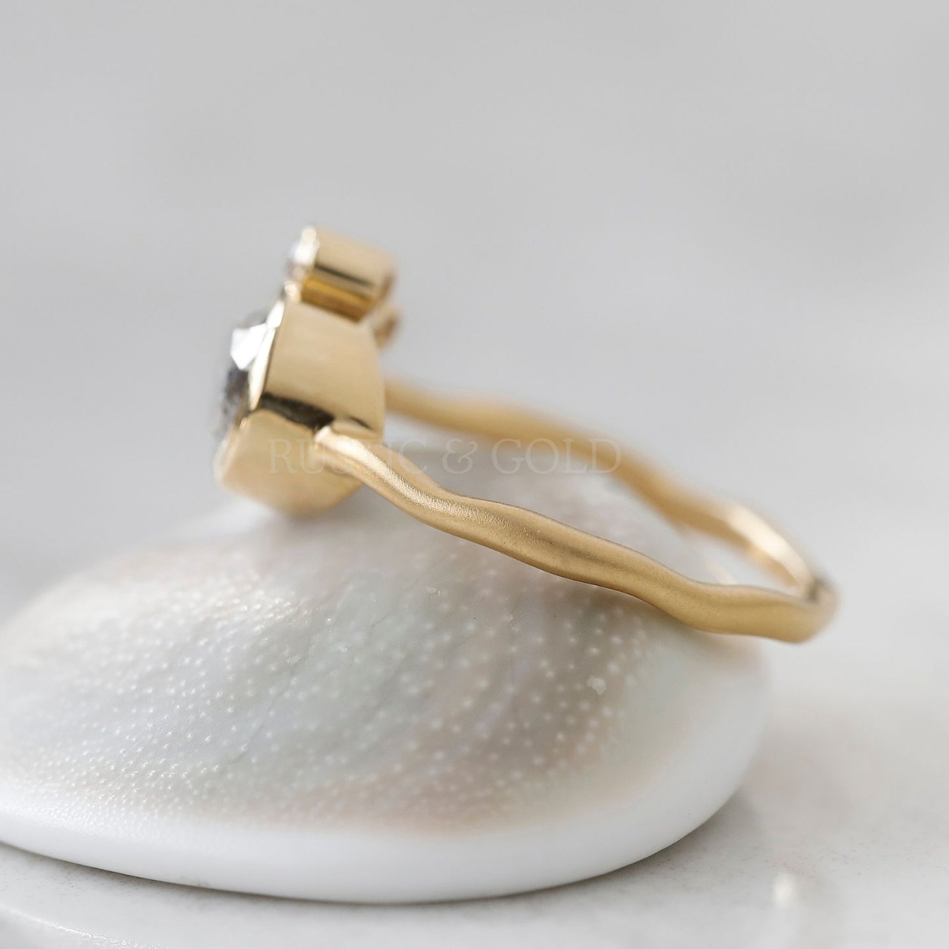 Artisan-crafted pear salt and pepper diamond ring with a unique sparkle