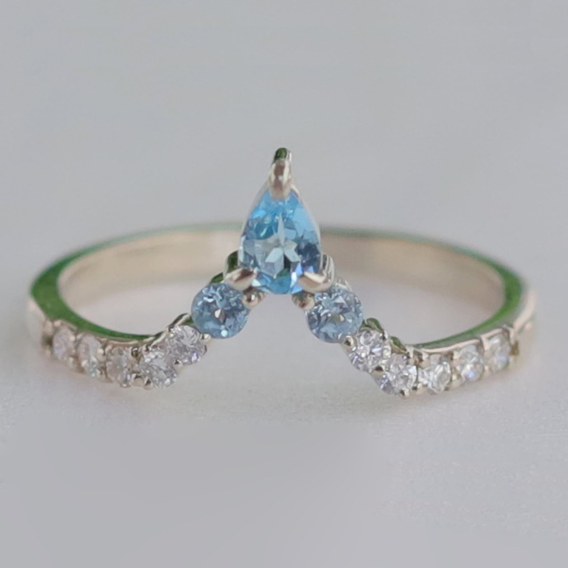 swiss blue topaz wedding band
