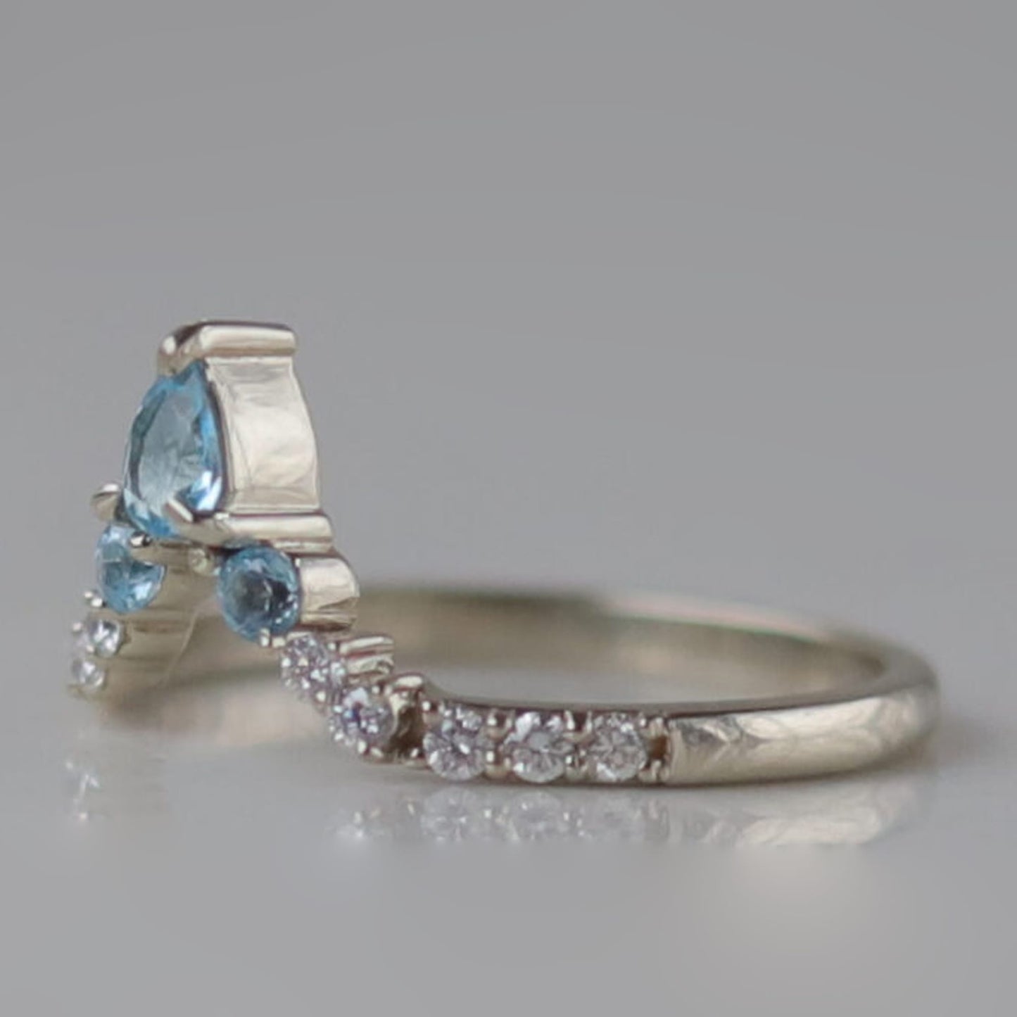 swiss blue topaz wedding band