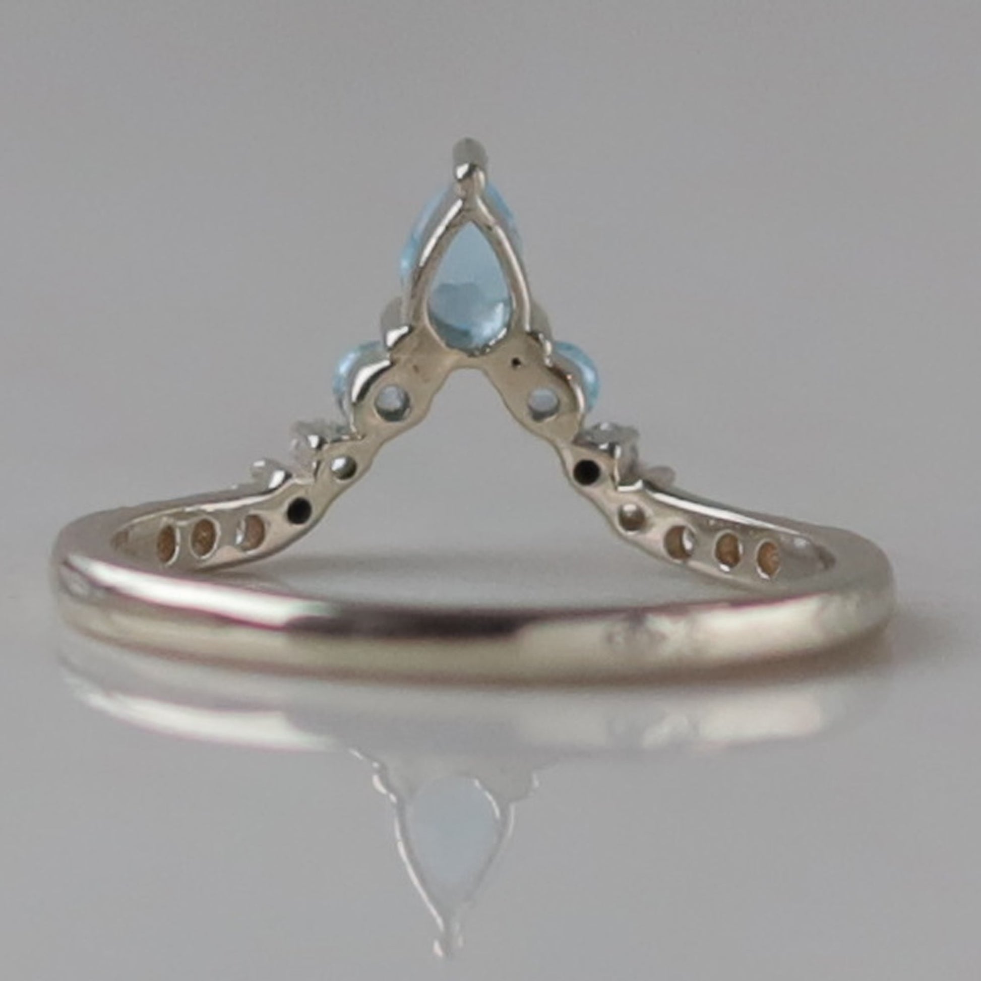 swiss blue topaz wedding band