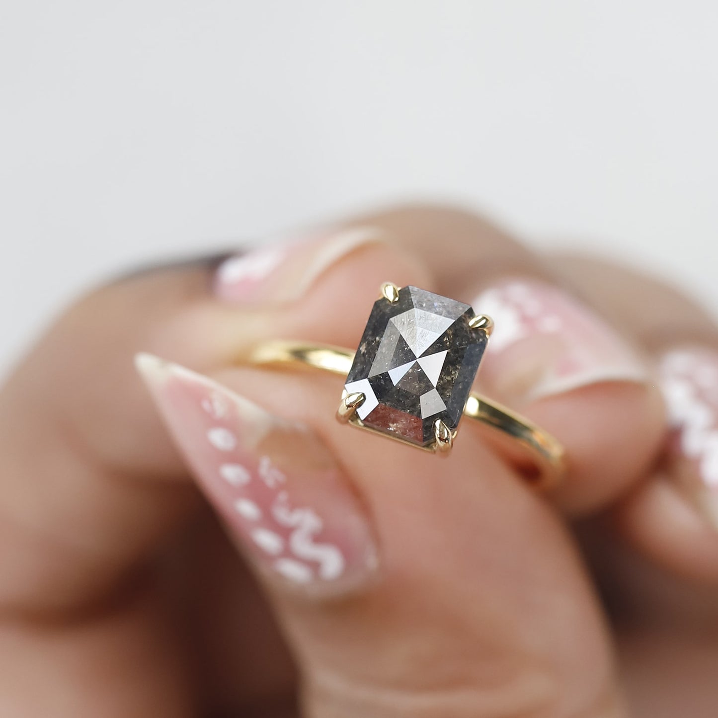 emerald cut salt and pepper diamond ring