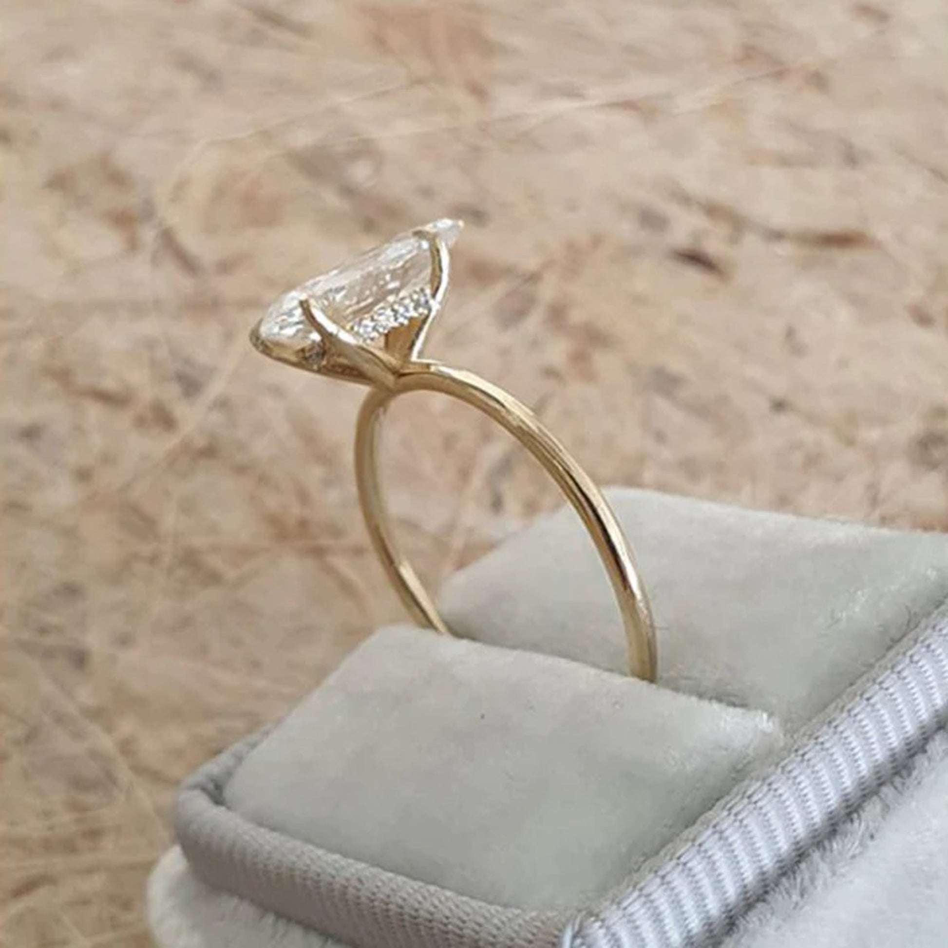 pear shaped moissanite engagement ring