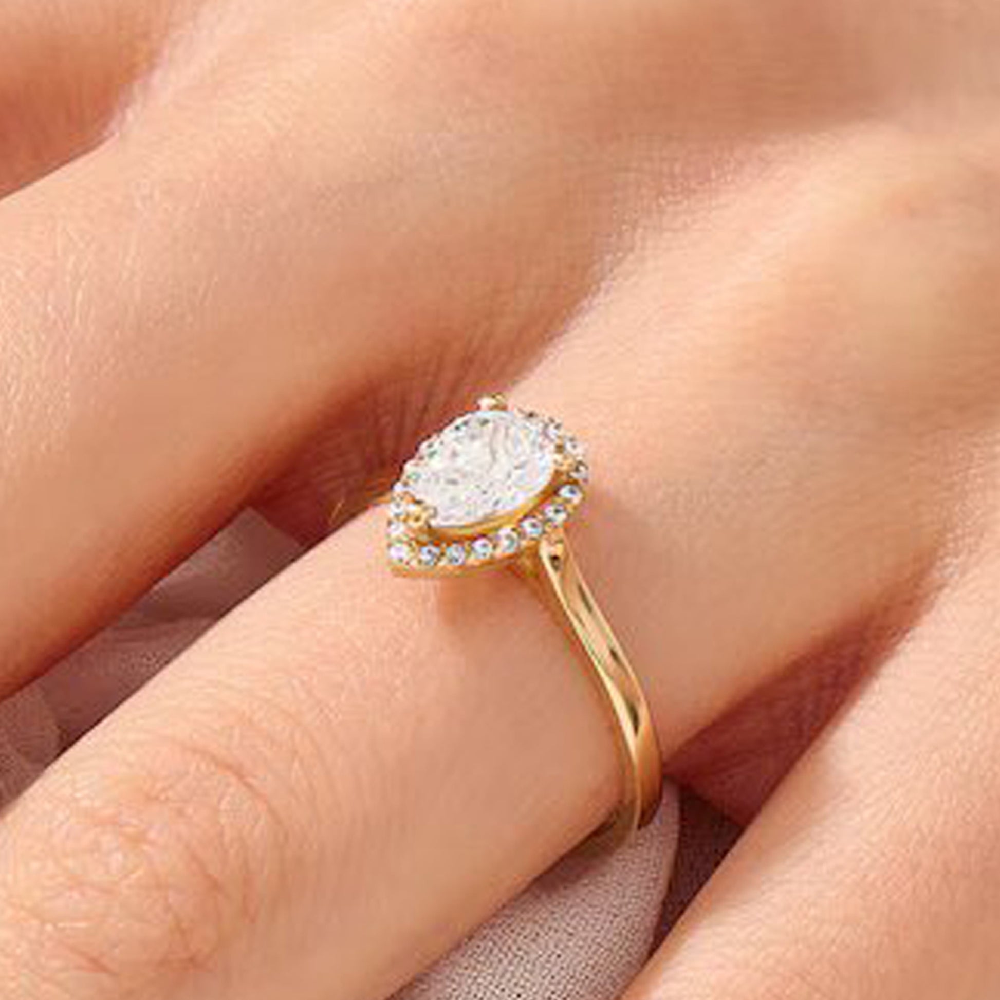 pear shaped moissanite ring