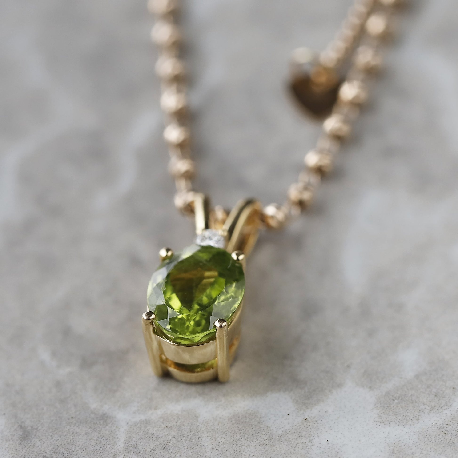 yellow gold peridot pendant