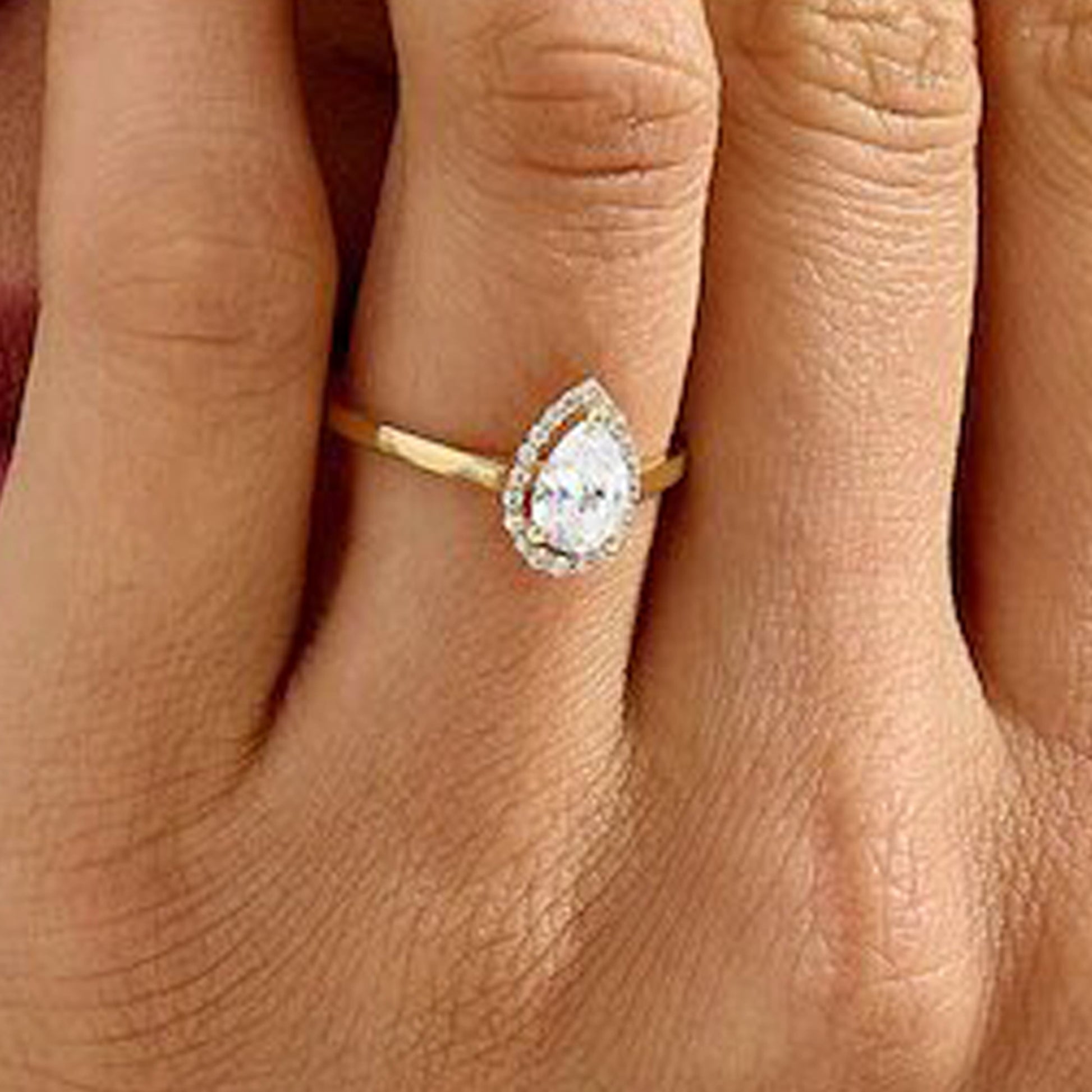pear shaped moissanite ring
