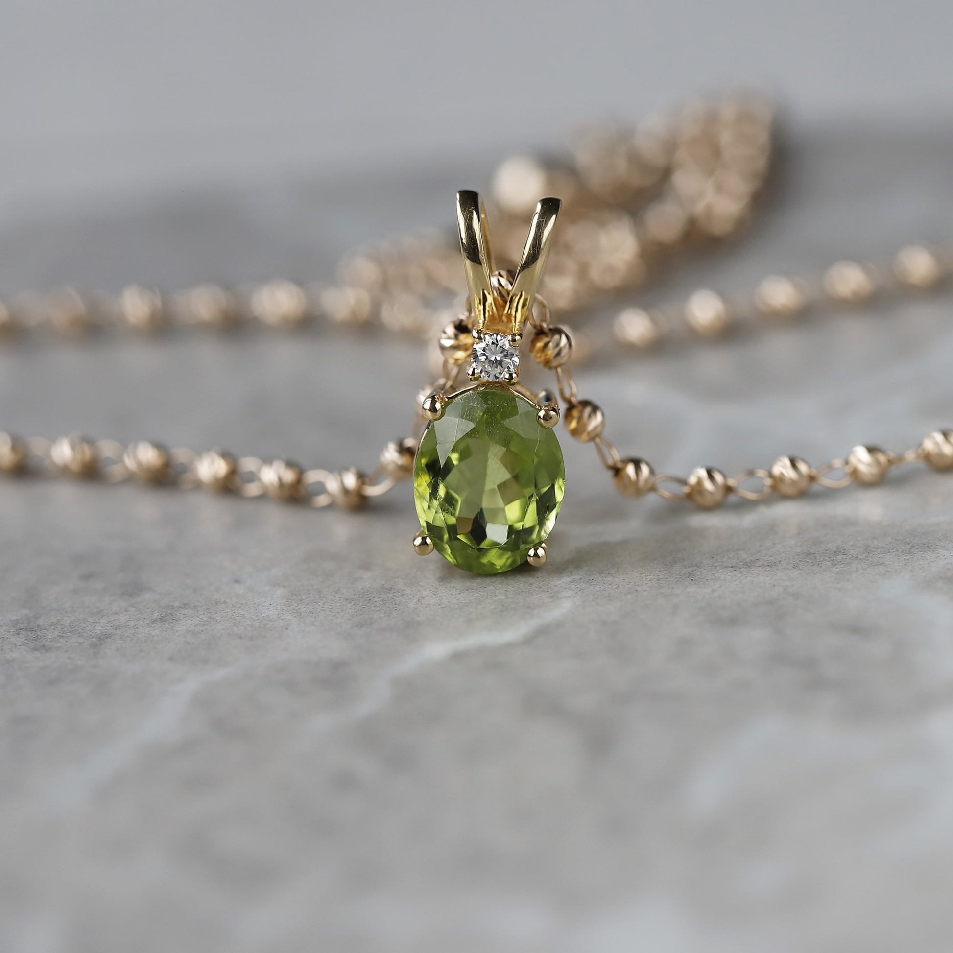 yellow gold peridot pendant