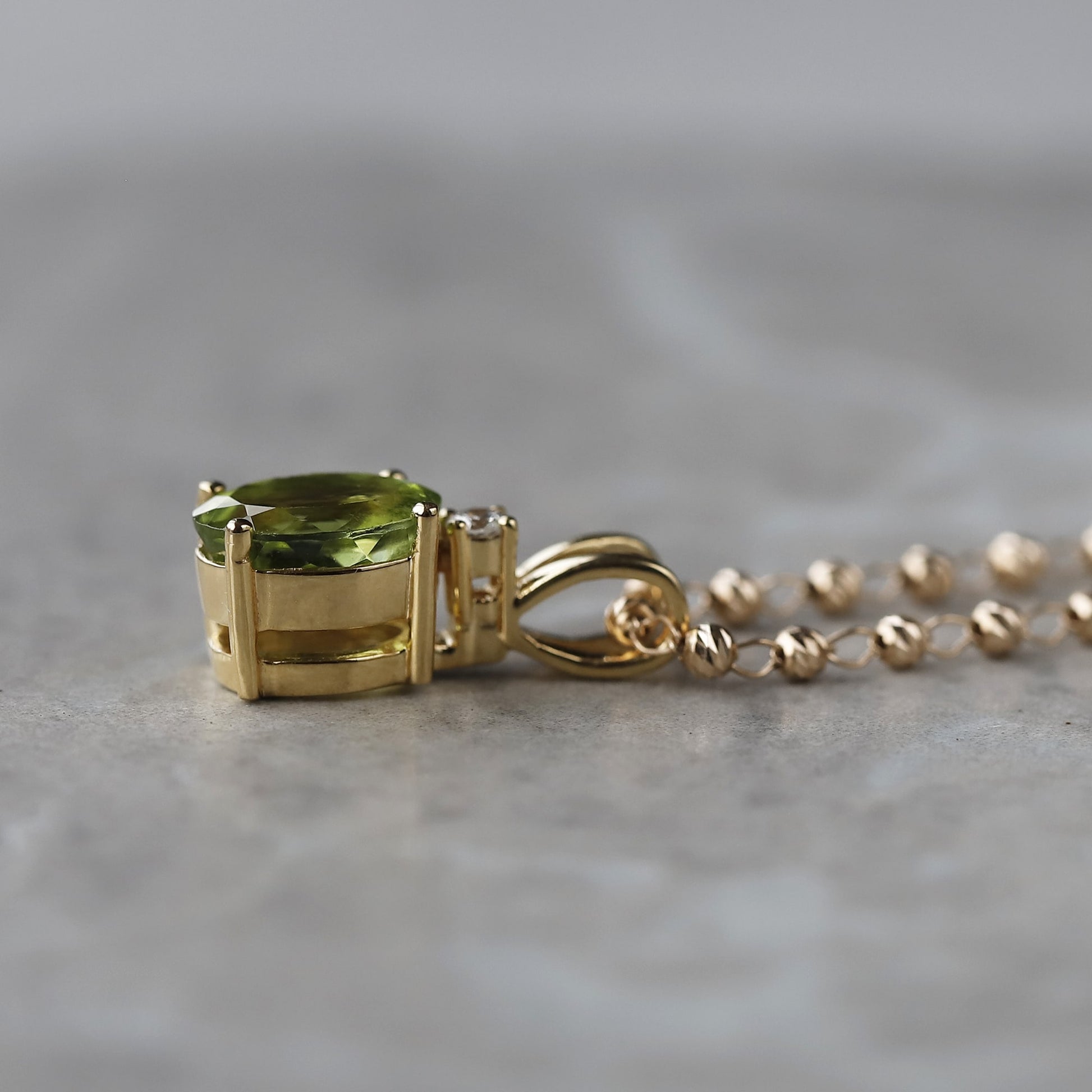 yellow gold peridot pendant