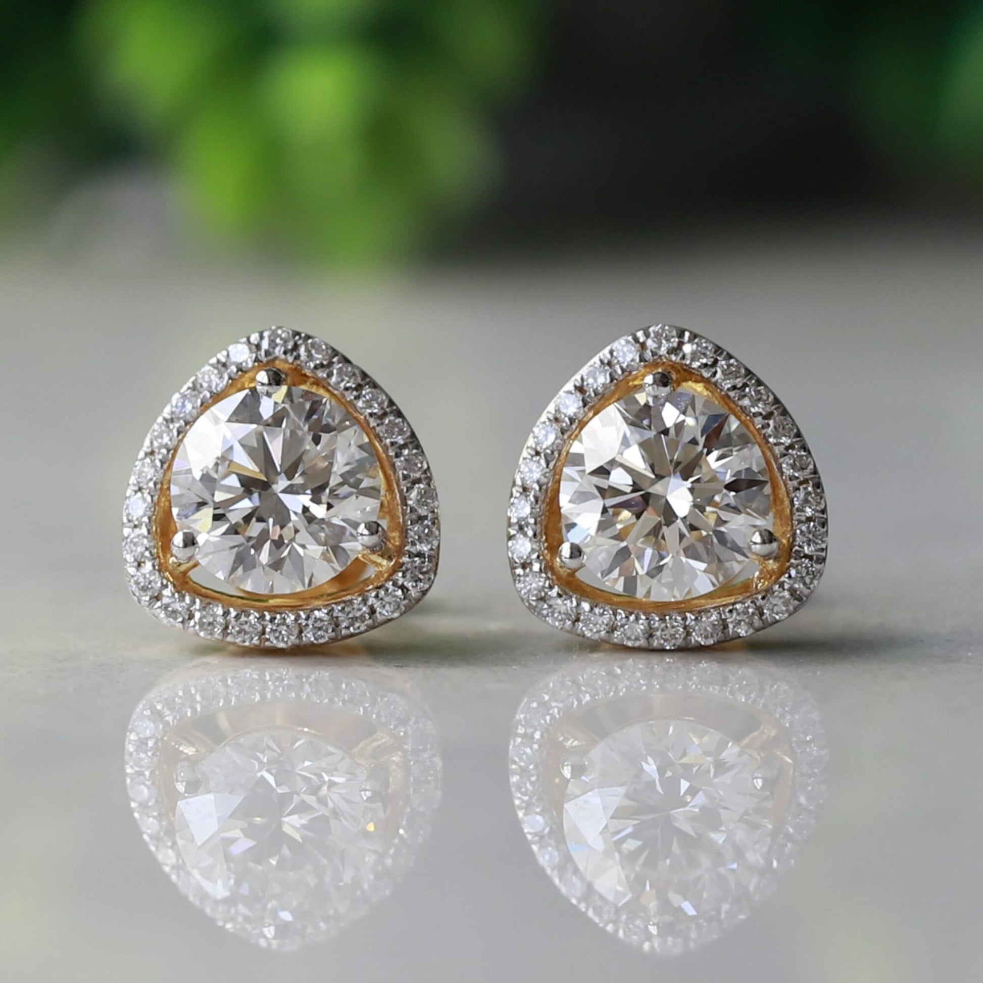Diamond earring with halo