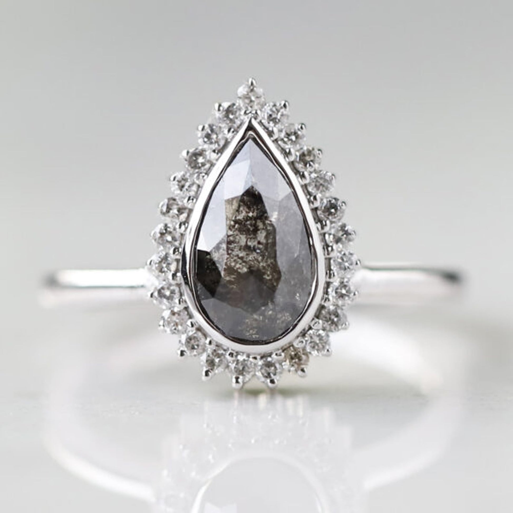 14k gold pear shaped salt and pepper diamond ring