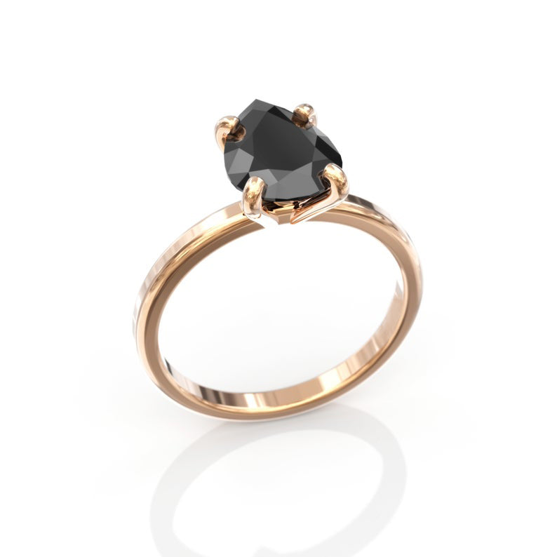 pear cut black diamond ring