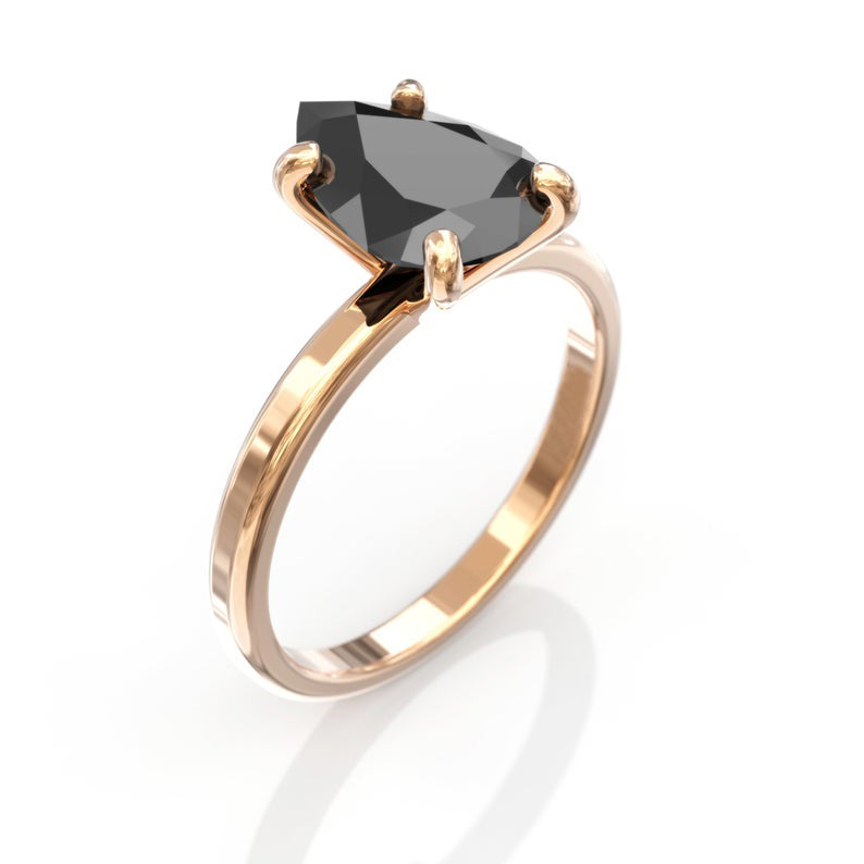 pear cut black diamond ring