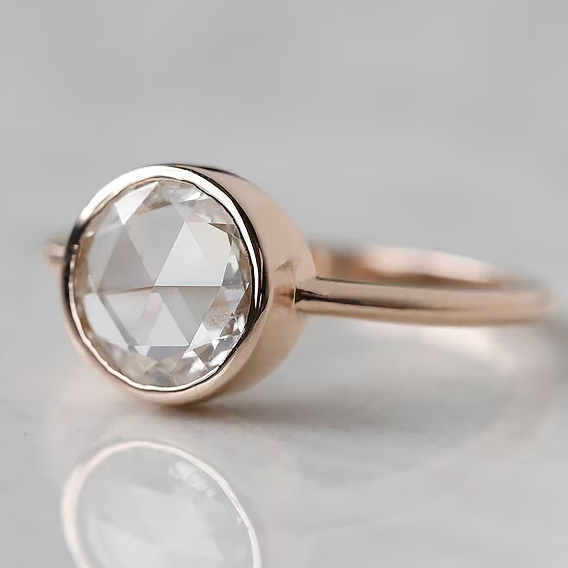 Elegant bezel set rose cut diamond ring in 14k gold