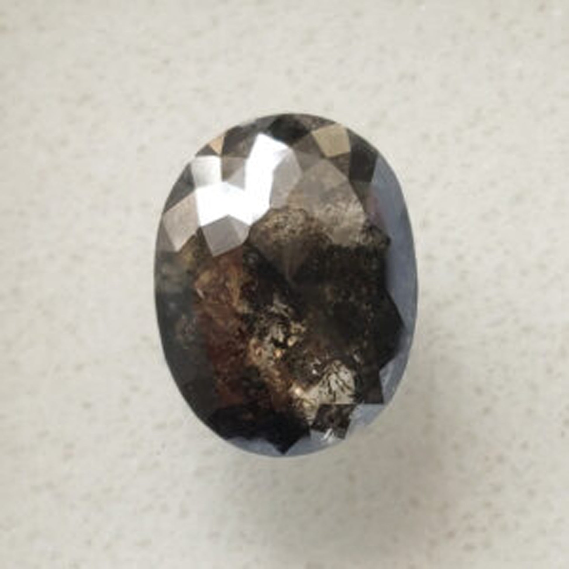 oval cut salt and pepper diamond