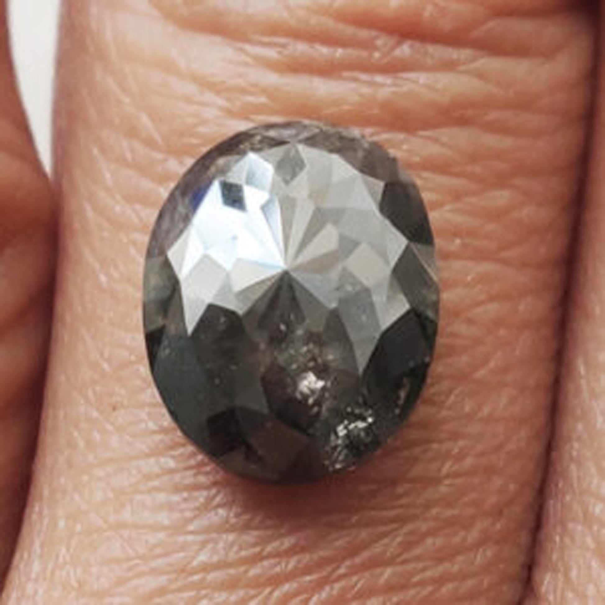 oval cut salt and pepper diamond