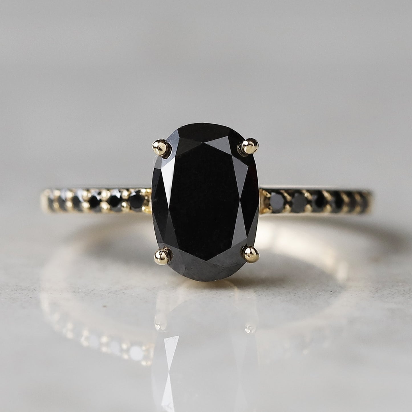 black oval diamond ring