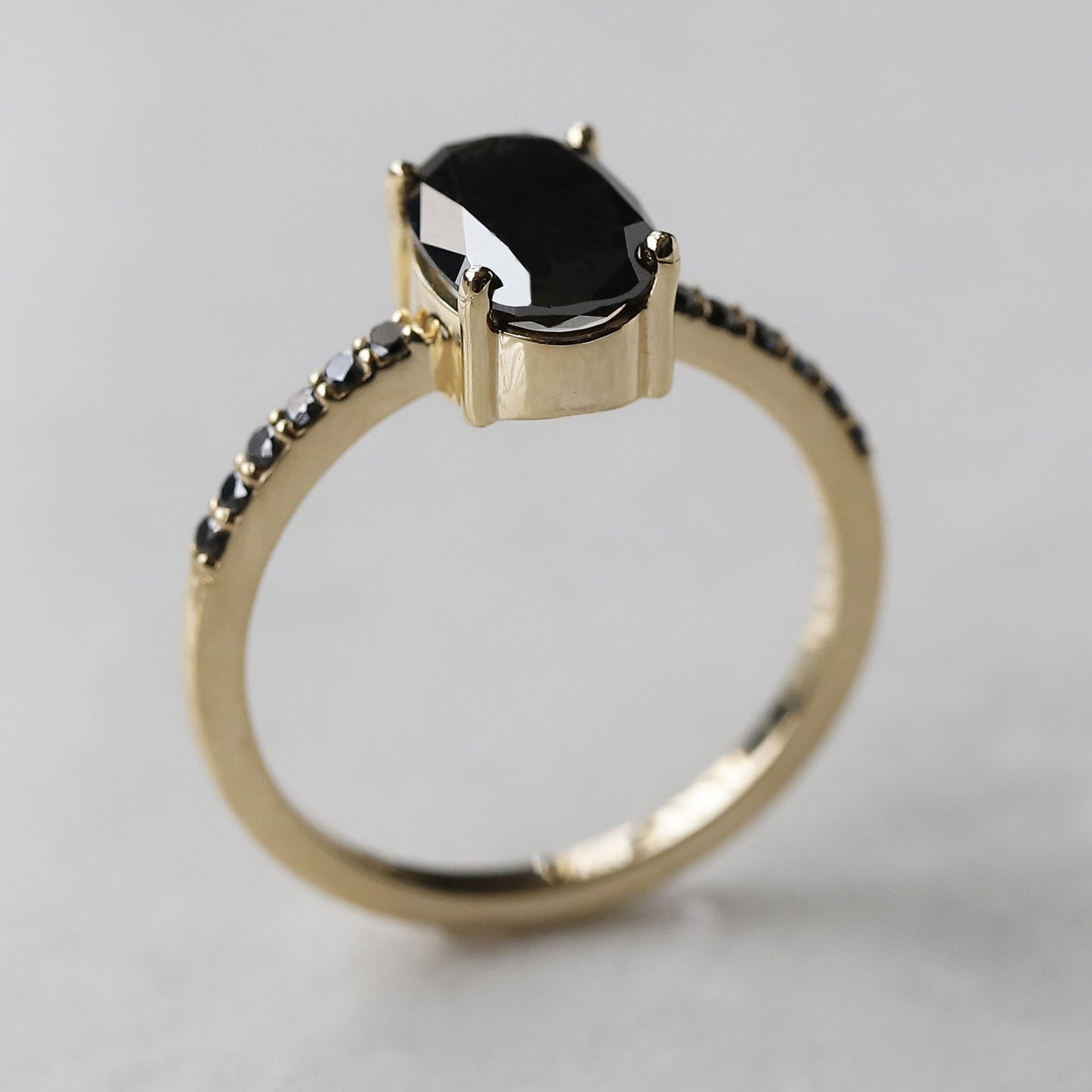 black oval diamond ring