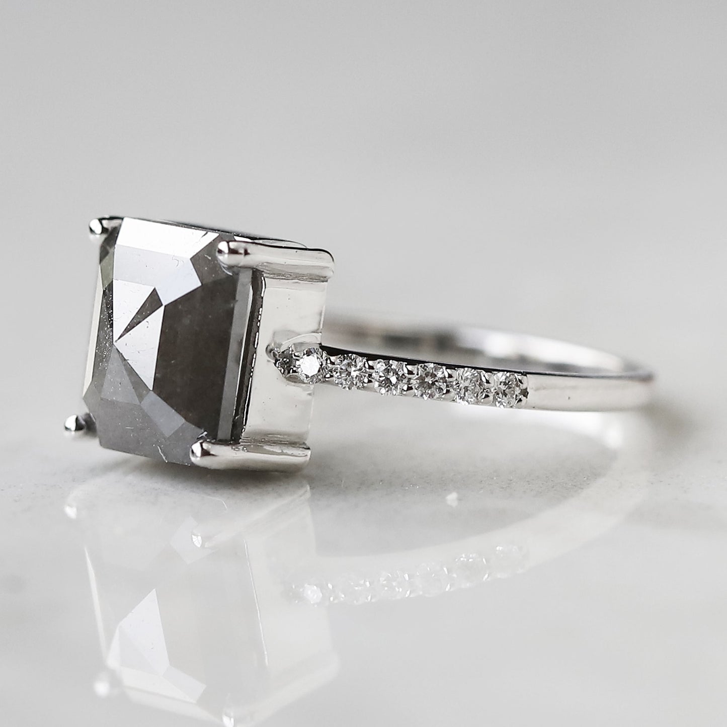 emerald cut salt and pepper diamond ring