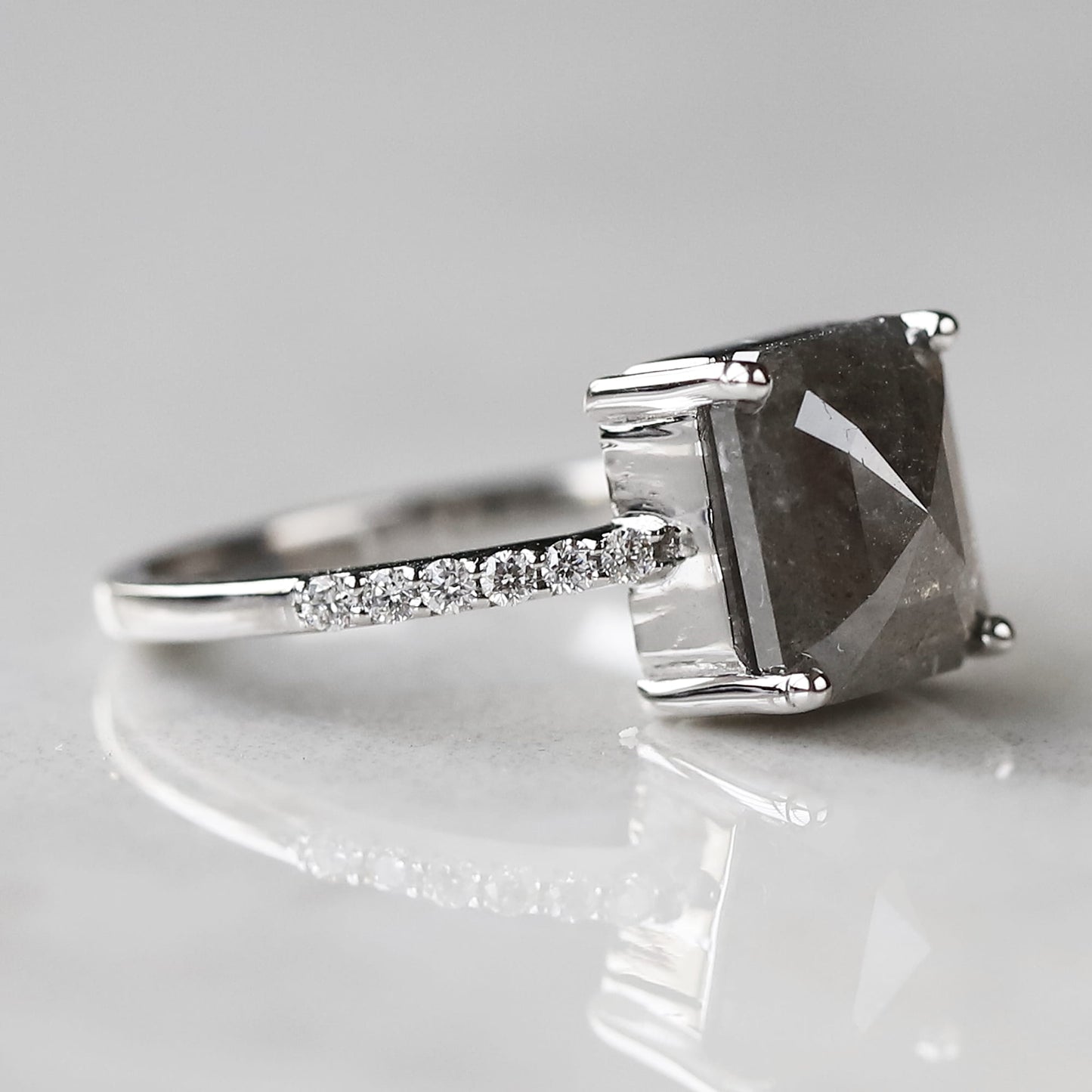 emerald cut salt and pepper diamond ring