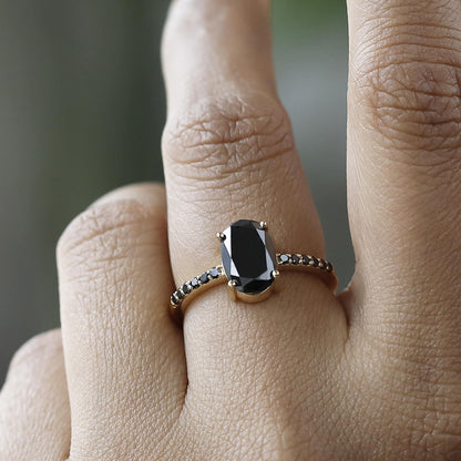 black oval diamond ring