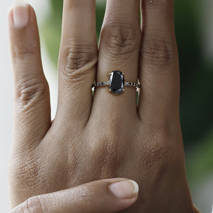 black oval diamond ring