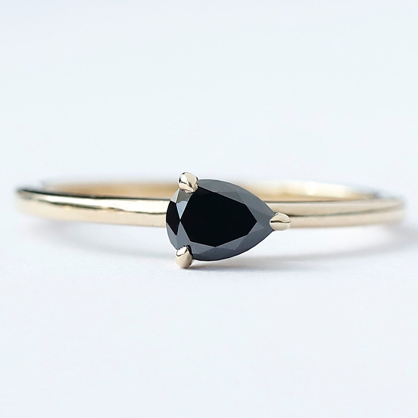 Black Diamond East West Pear Diamond Ring