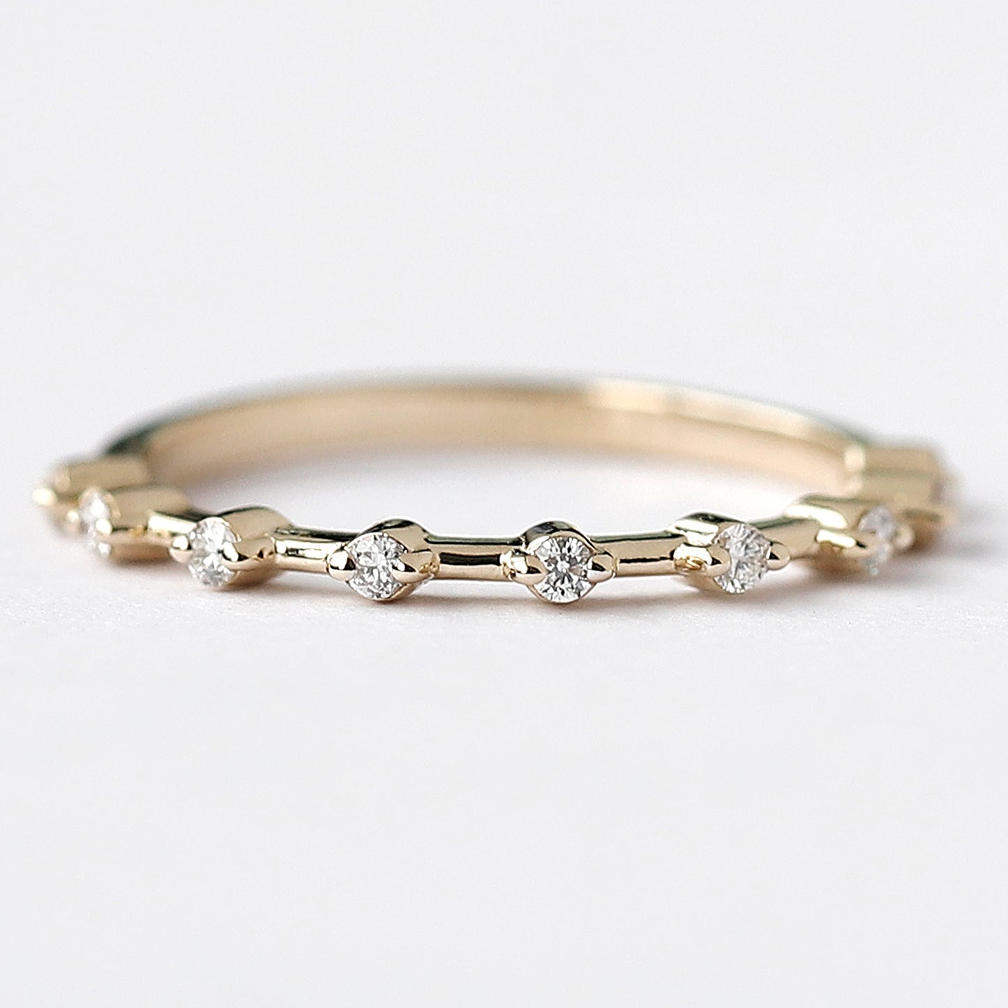 yellow gold half eternity band