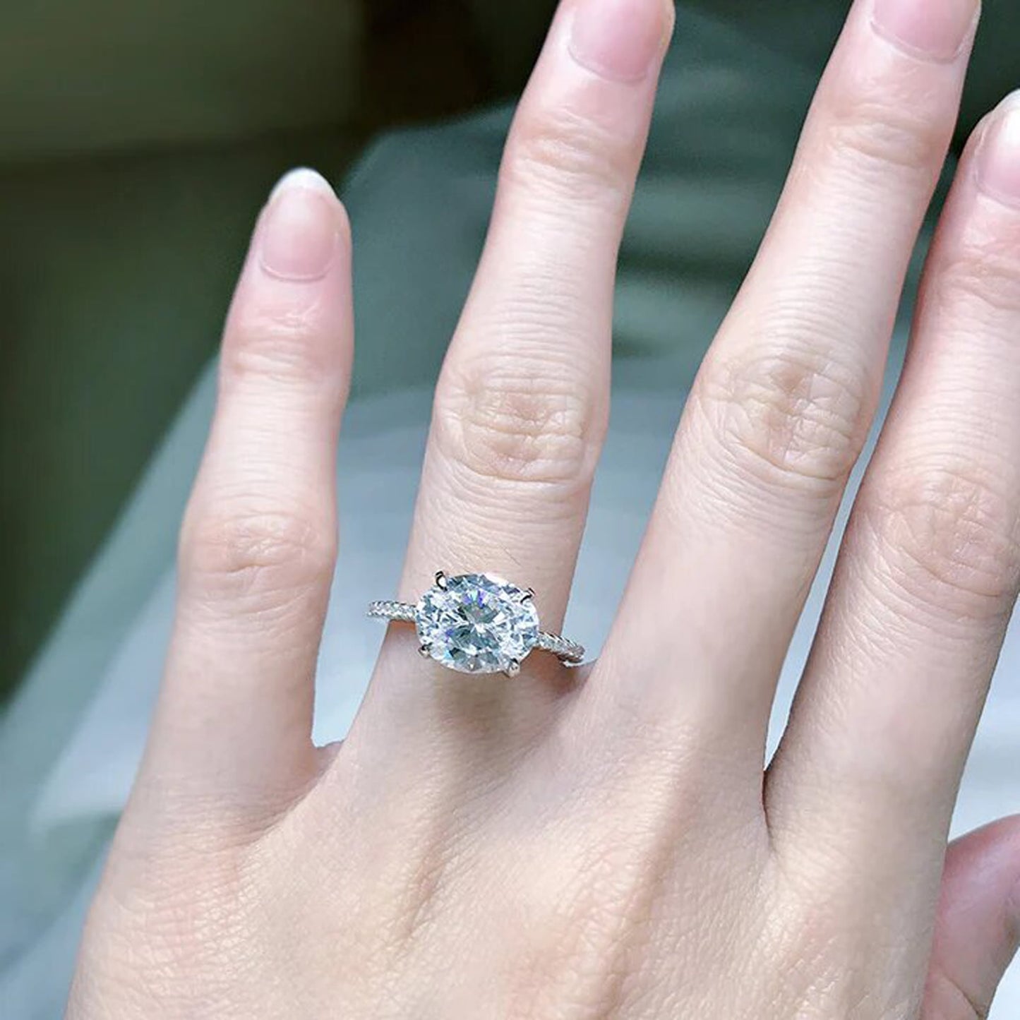 oval east west engagement ring