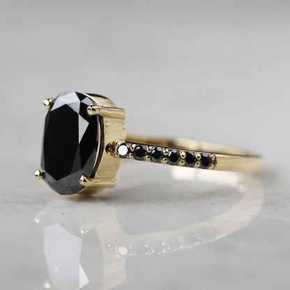 black oval diamond ring