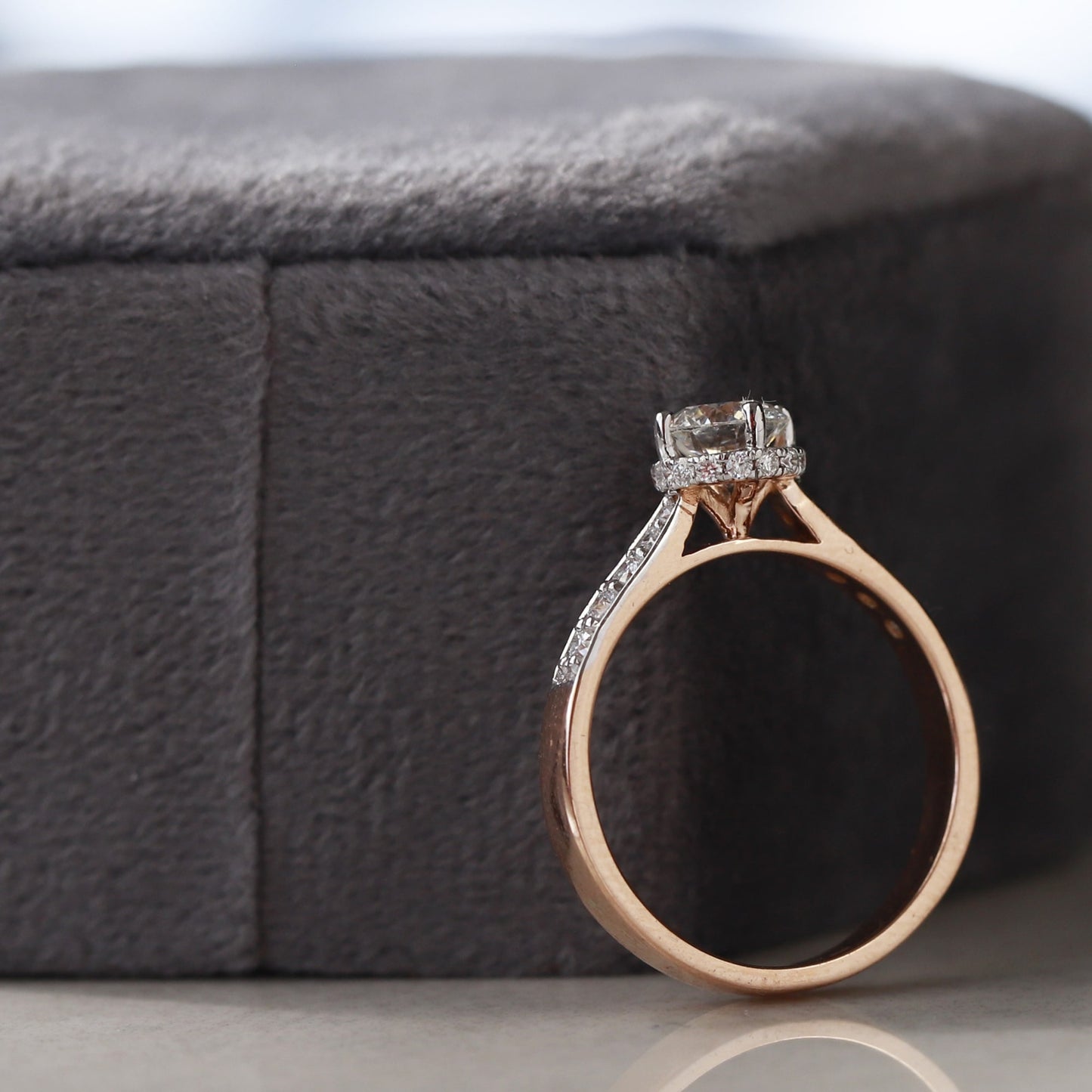 hidden halo engagement ring rose gold