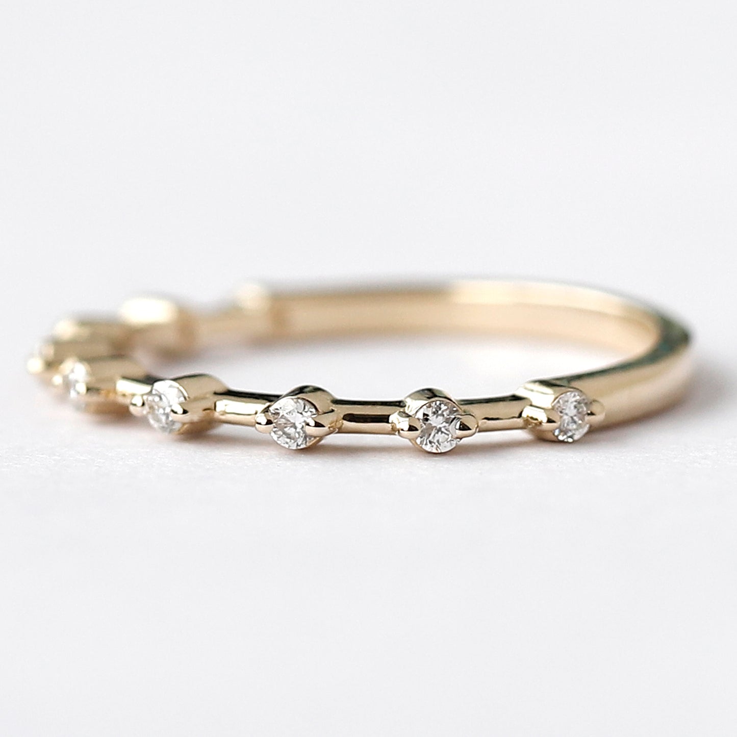 yellow gold half eternity band