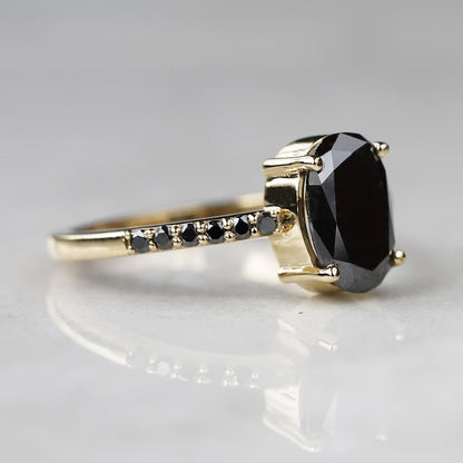 black oval diamond ring