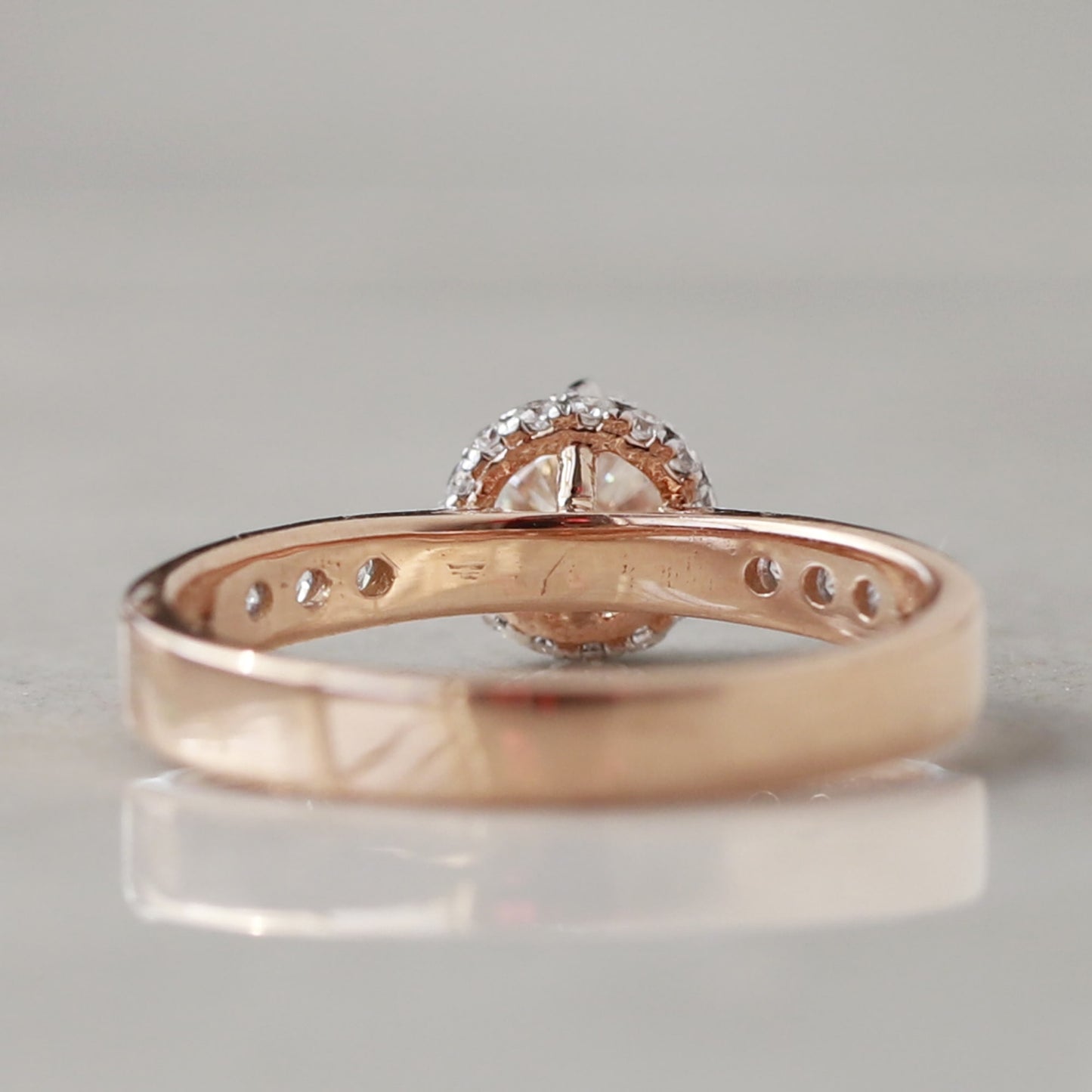 hidden halo engagement ring rose gold