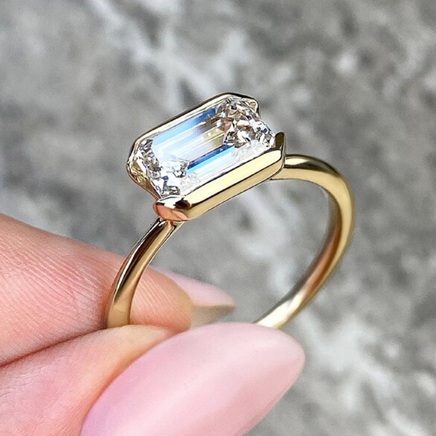 emerald cut moissanite engagement rings