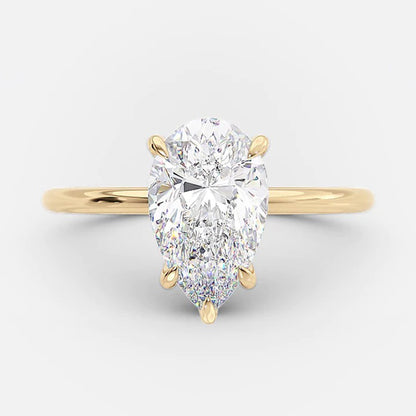 pear shaped moissanite engagement ring