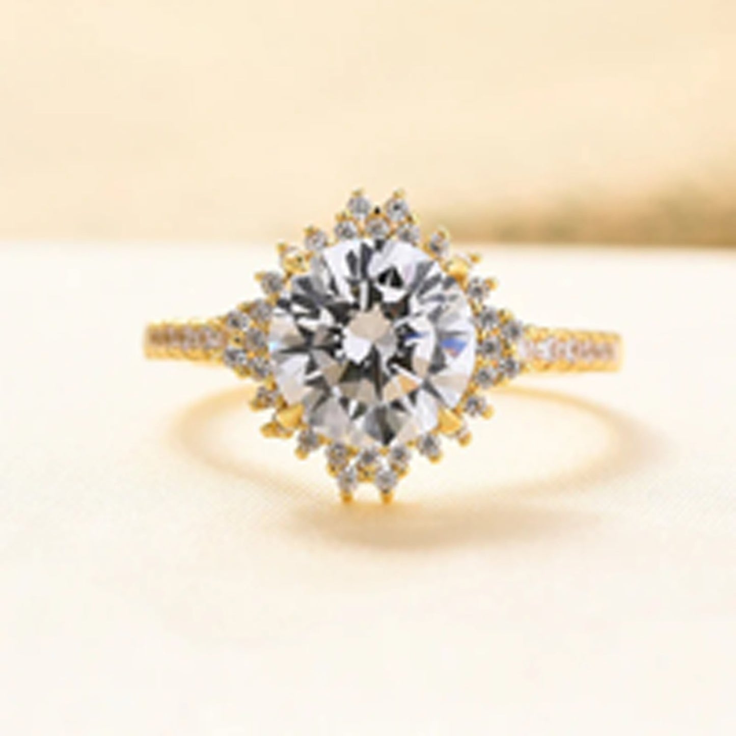 sunburst halo engagement ring