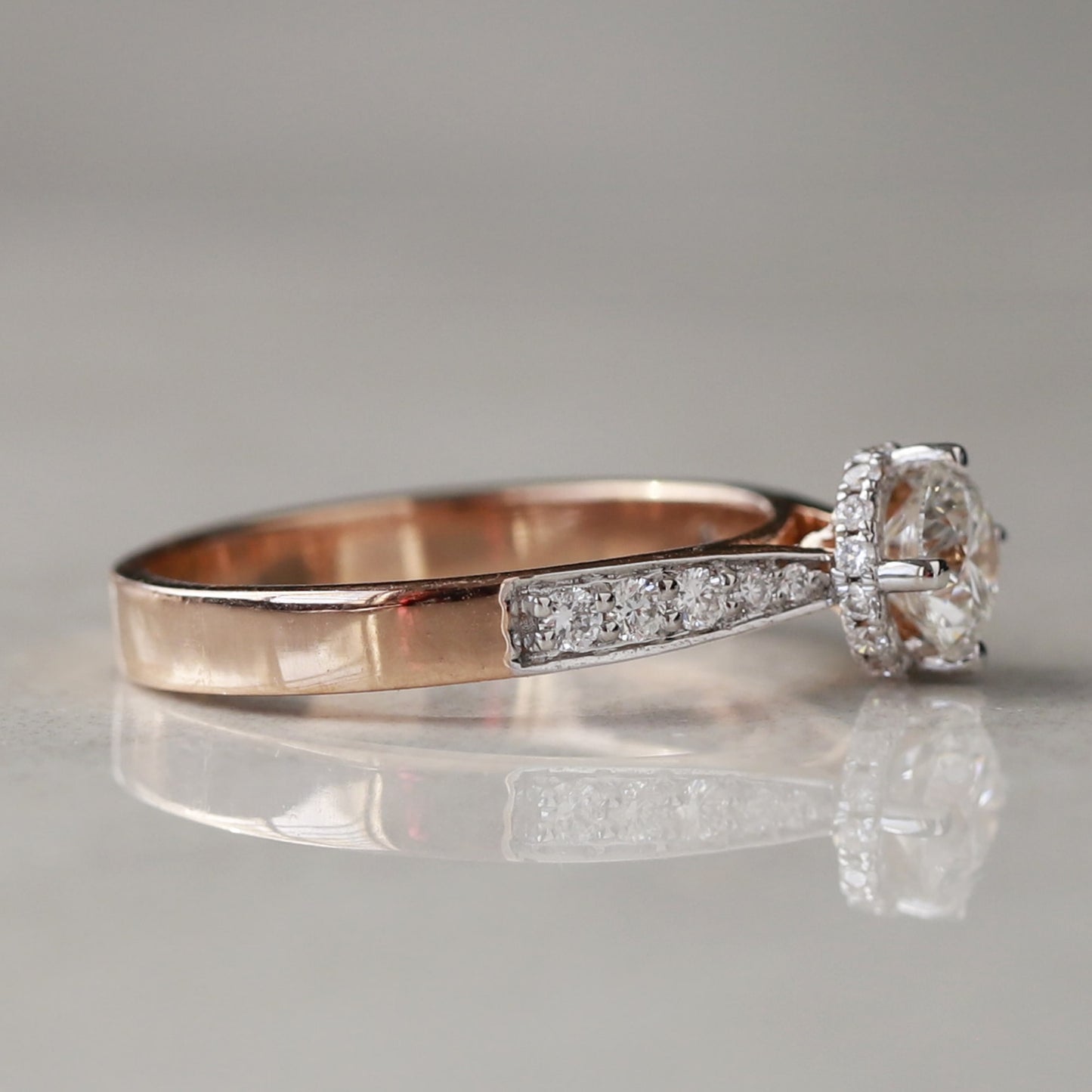 hidden halo engagement ring rose gold