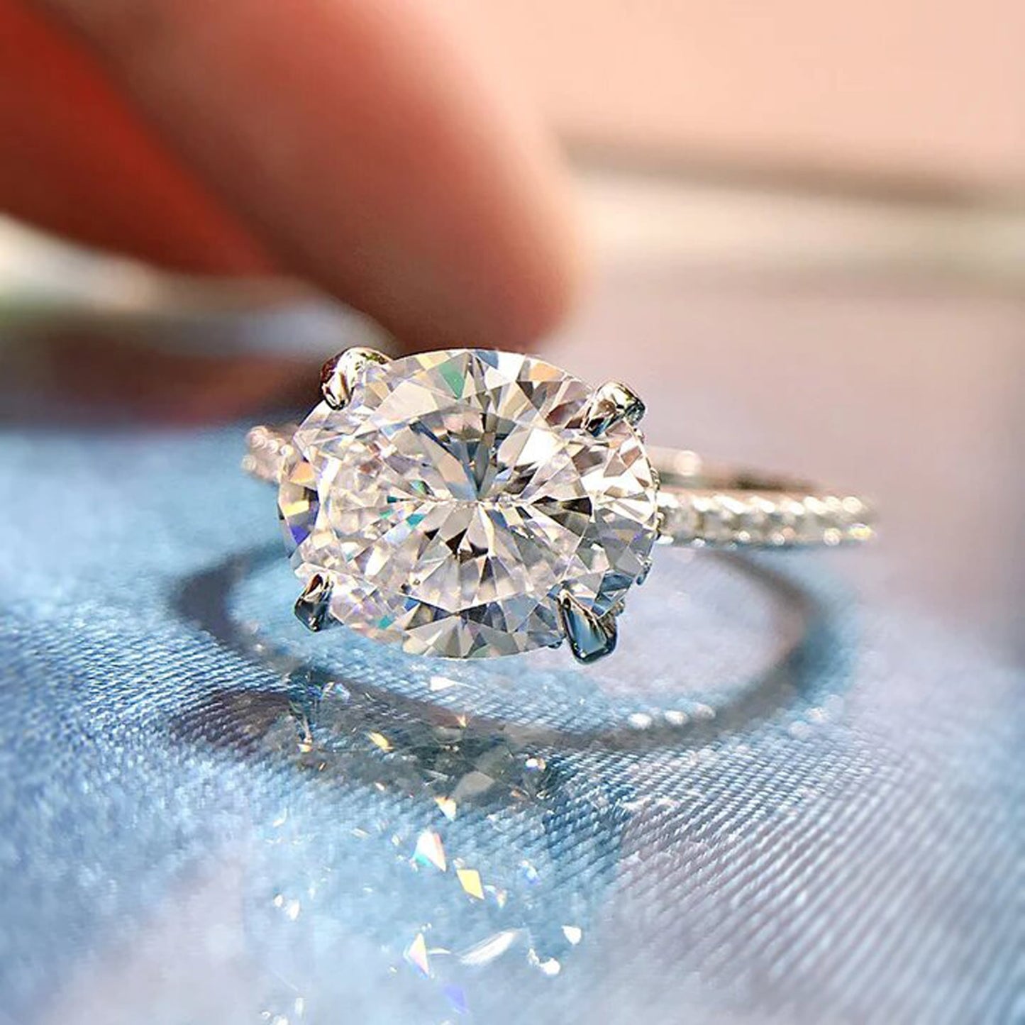 oval east west engagement ring