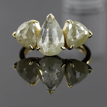 pear three stone ring