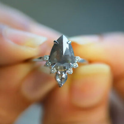 salt and pepper pear engagement ring