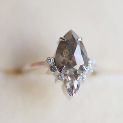 salt and pepper pear engagement ring